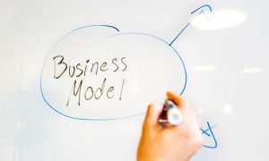 Words "Business model" on a whiteboard