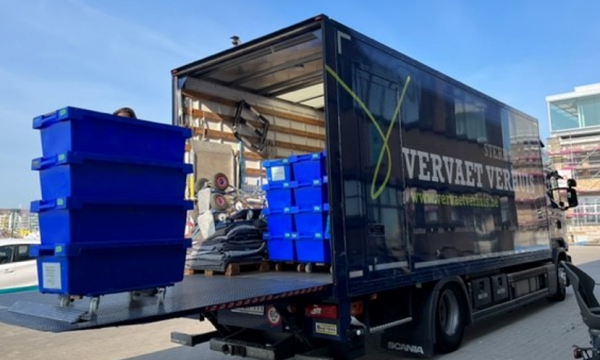 Moving truck with blue containers