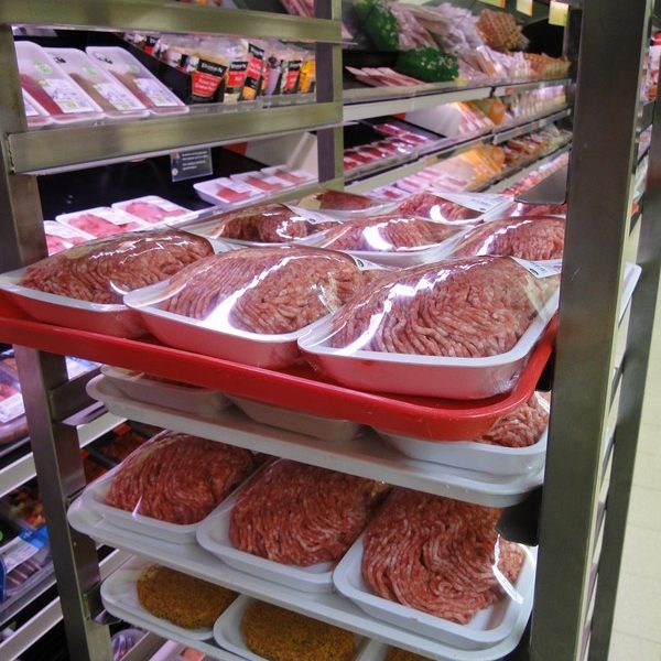 meat on a rack at the store