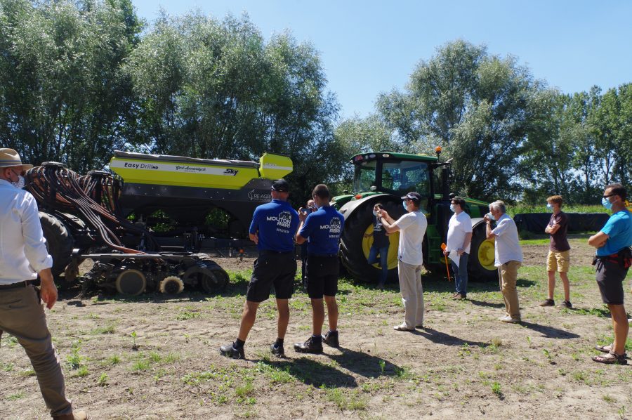 People watching a tractor demo